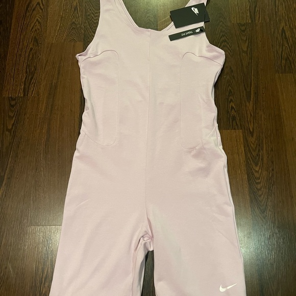 Nike
WOMEN'S NIKE SPORTSWEAR ICON CLASH ONE PIECE
Bodysuit 

Style: CZ9326-576 - Picture 2 of 5